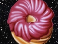 PINK FROSTED CRULLER IN OUTER SPACE